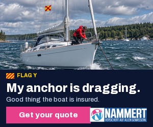 NAMMERT banner: sailing yacht flying signal flag Y