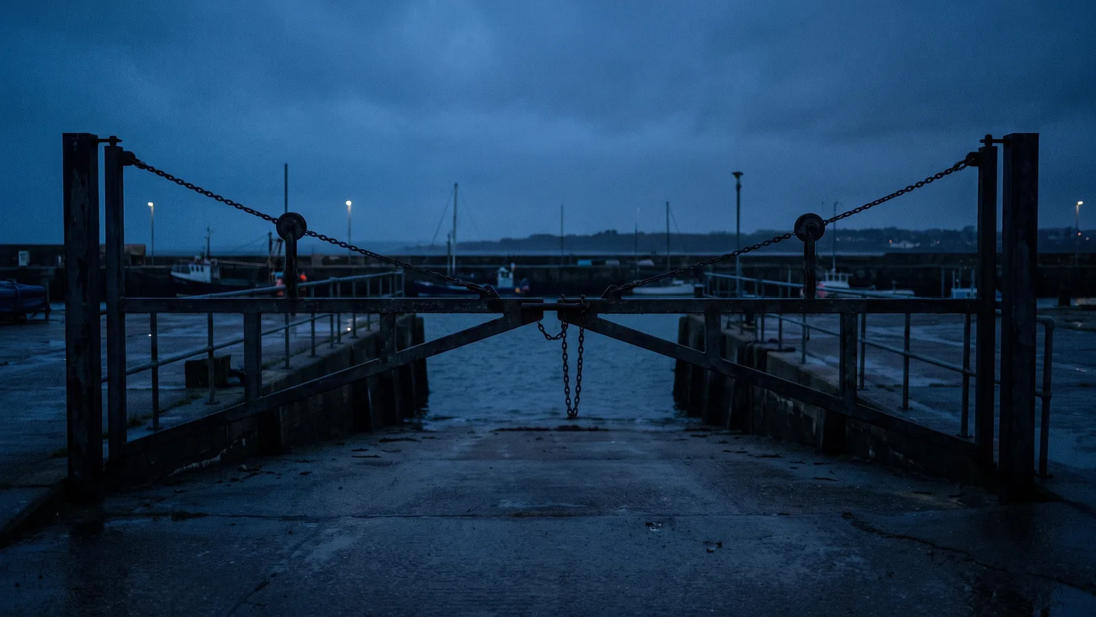 A scale of justice beside a pleasure craft at a pontoon, standing for the legal duty behind a boat